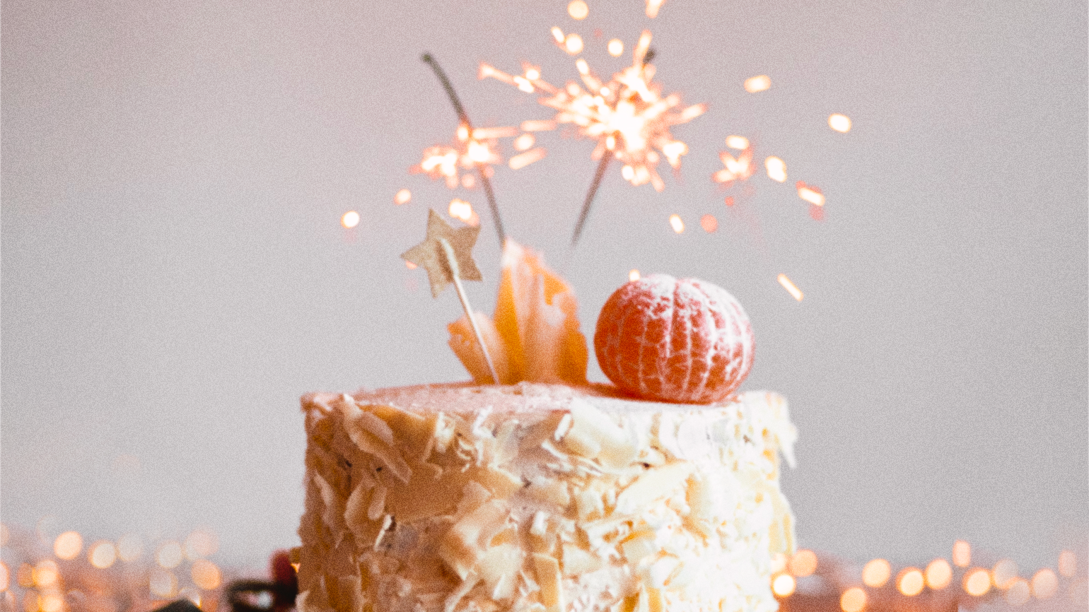 A cake with sparklers to celebrate the different types of goals